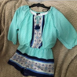 Multicolored romper. Size L.